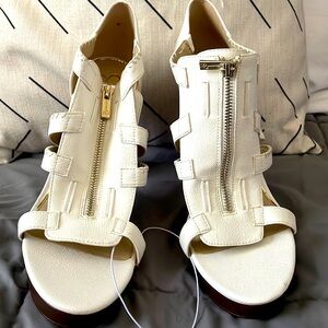 Never worn Jessica Simpson heels. Size 11.